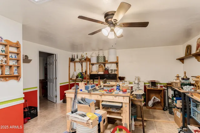 a view of a workspace with furniture