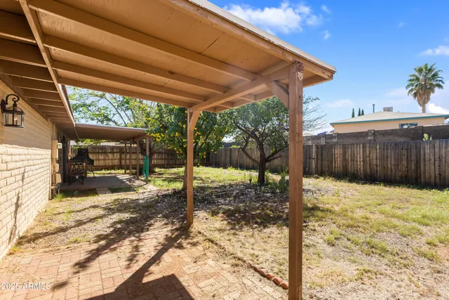 a view of a backyard space