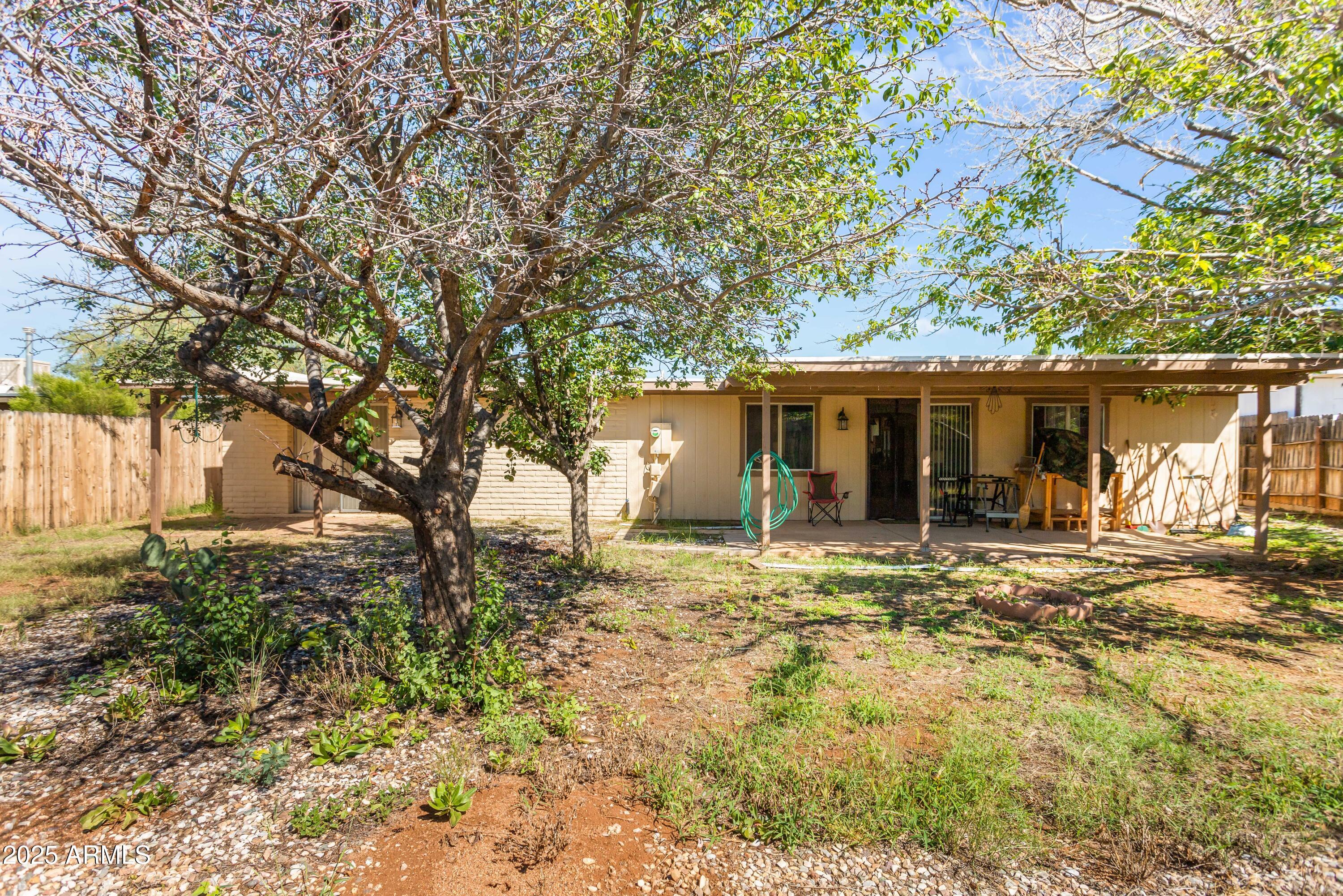 4964 East Raffaele Avenue Sierra Vista, AZ 85635 - Photo 36 of 41 a view of a house with yard and tree s