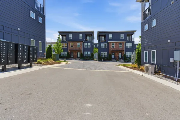 a view of a building with a street