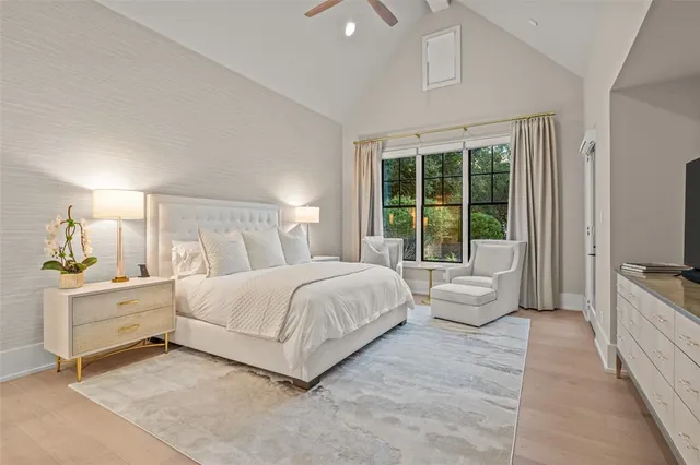 a bedroom with a bed and a couch