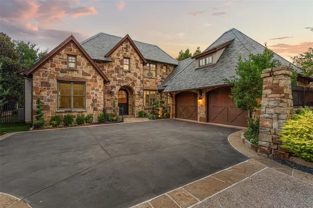 front view of a house with a garden
