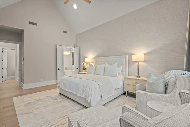 a bathroom with a shower sink and mirror