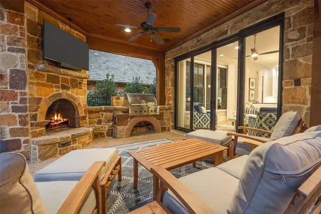 a front view of a house with a yard table and chairs
