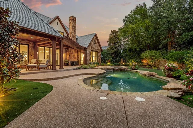 a view of a house with a swimming pool