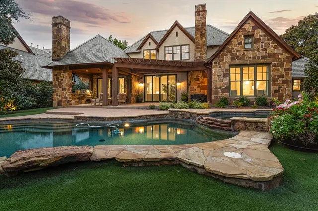 a view of a house with swimming pool