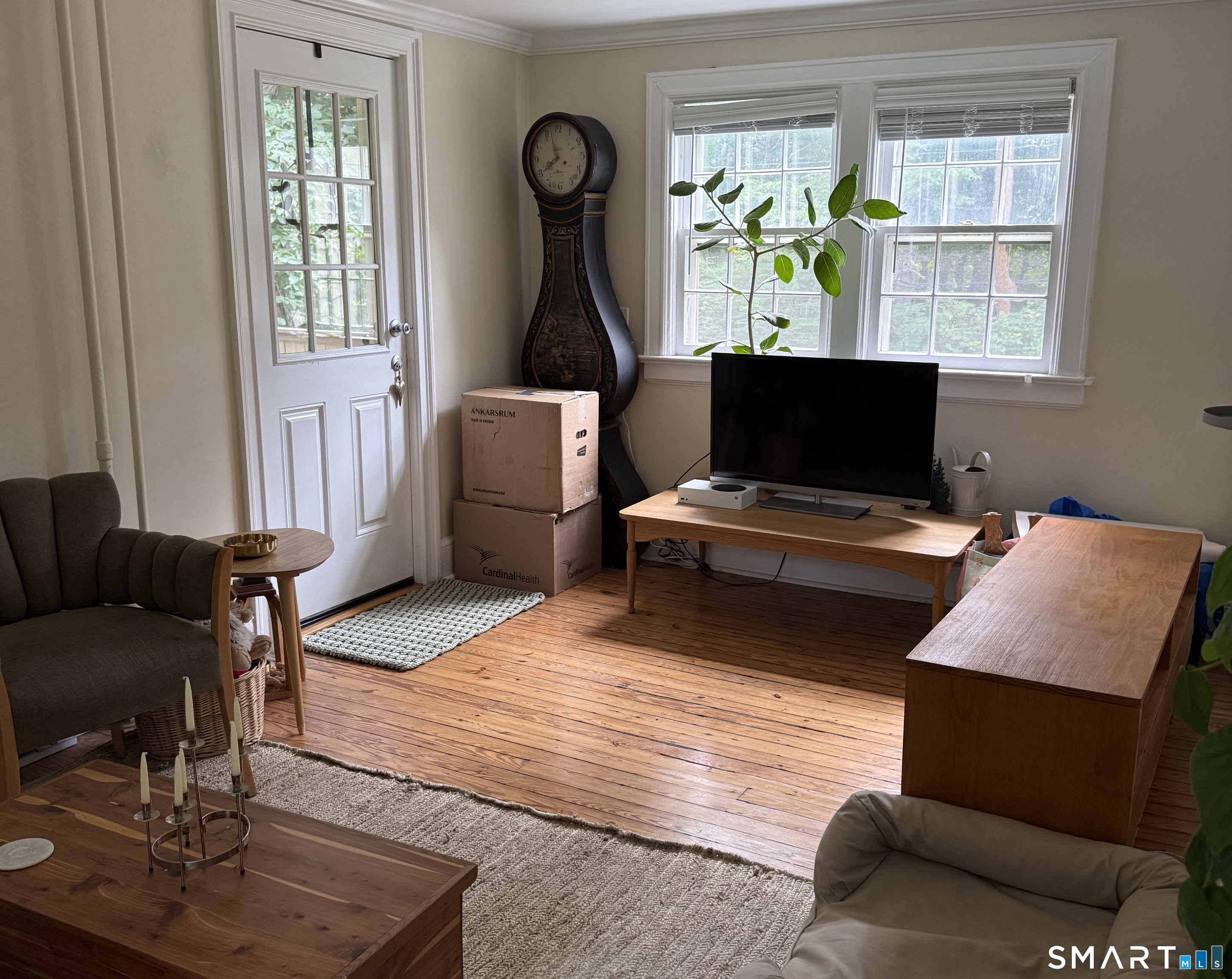 252 West Norwalk Road Norwalk, CT 06850 - Photo 8 of 23 Living room has access to back porch