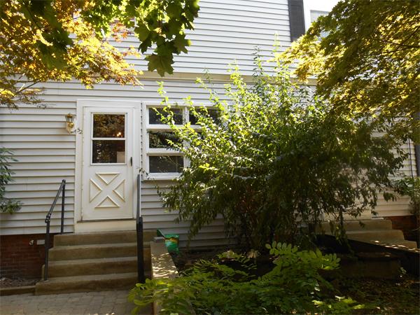 52 Meacham Road, Unit 52 Somerville, MA 02144 - Photo 2 of 12 a view of a entrance gate of the house
