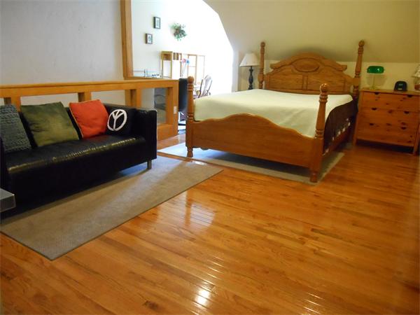 52 Meacham Road, Unit 52 Somerville, MA 02144 - Photo 9 of 12 a bedroom with a bed and window