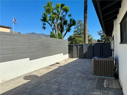 a view of balcony with furniture