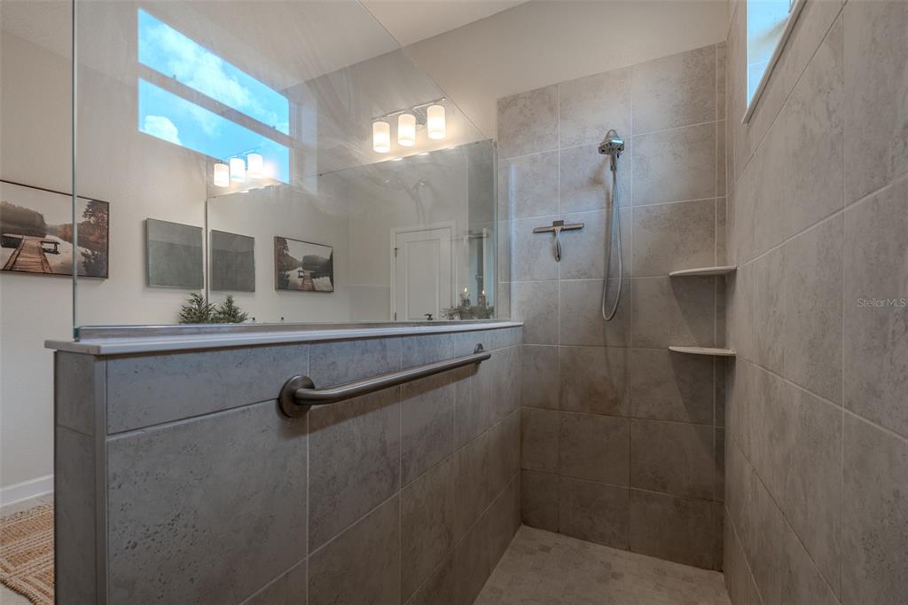 9224 Southwest 60th Ct Road Ocala, FL 34476 - Photo 33 of 55 a bathroom with a shower and a sink