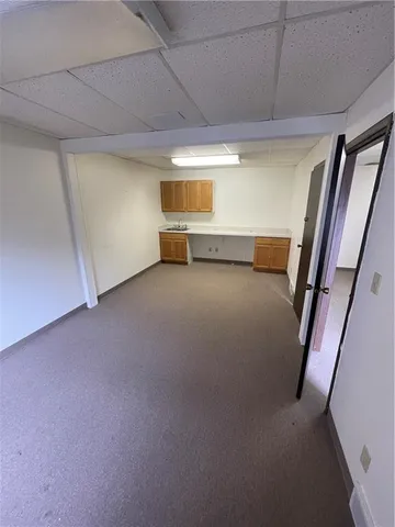 an empty room with a bench