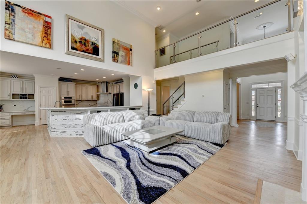 1830 Briergate Drive Duluth, GA 30097 - Photo 15 of 61 a living room with furniture and a wooden floor