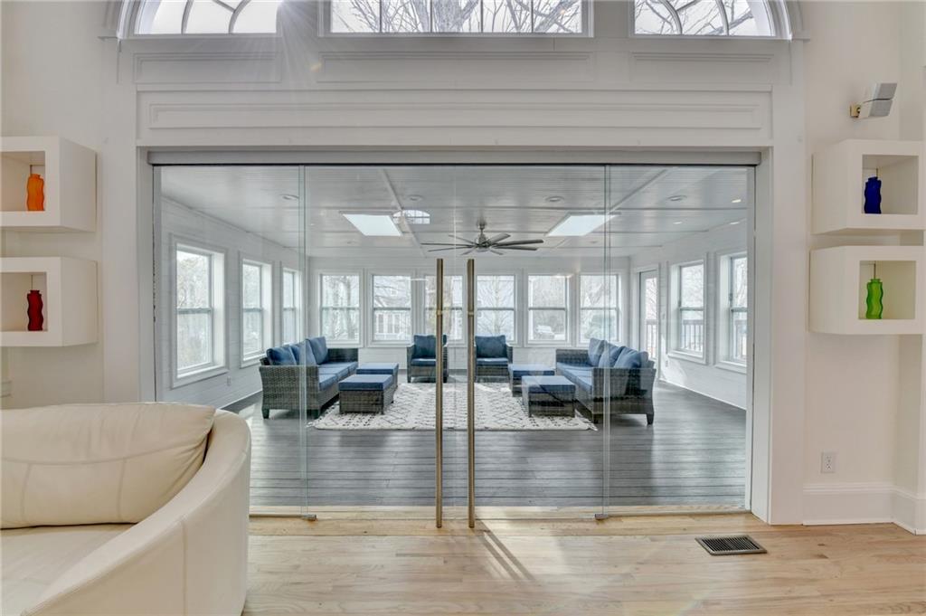 1830 Briergate Drive Duluth, GA 30097 - Photo 19 of 61 a view of a dining room with furniture wooden floor and a chandelier
