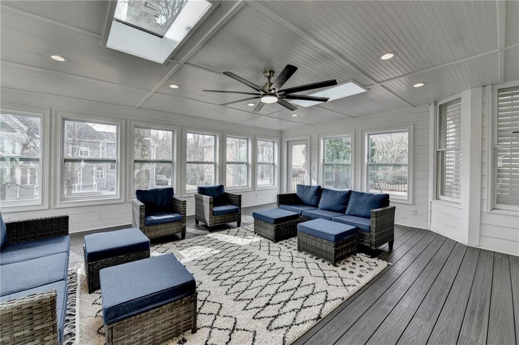 1830 Briergate Drive Duluth, GA 30097 - Photo 20 of 61 a living room with furniture ceiling fan and a large window