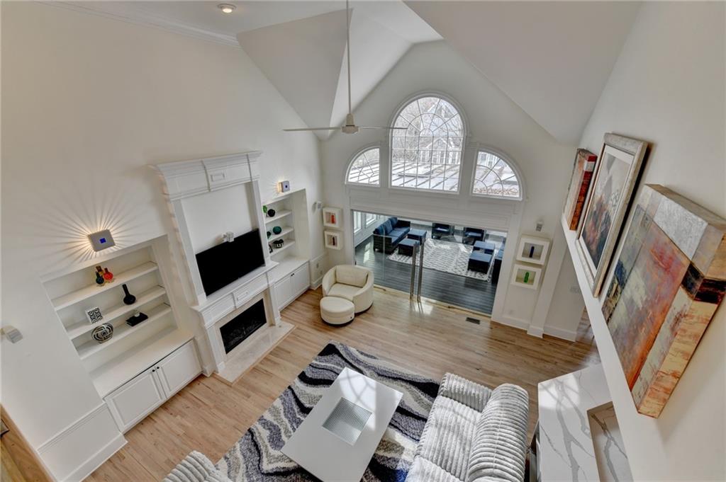 1830 Briergate Drive Duluth, GA 30097 - Photo 30 of 61 a view of a dining room with furniture a rug and wooden floor