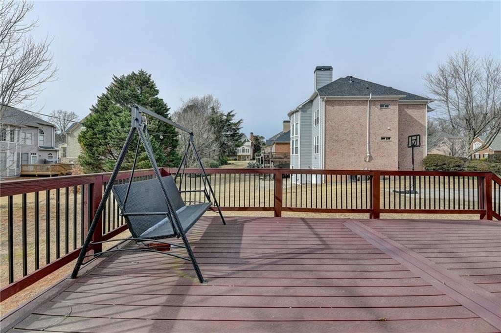 1830 Briergate Drive Duluth, GA 30097 - Photo 50 of 61 a view of a deck with wooden floor and fence
