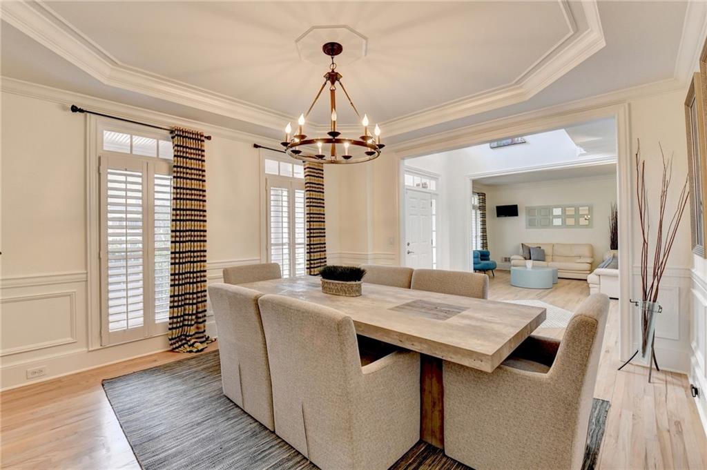1830 Briergate Drive Duluth, GA 30097 - Photo 8 of 61 a view of a dining room with furniture window and wooden floor