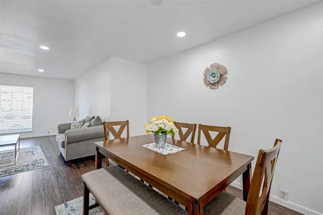 a view of a dining room with furniture