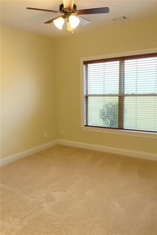 2231 Cain Commons Drive Dacula, GA 30019 - Photo 16 of 20 an empty room with a window