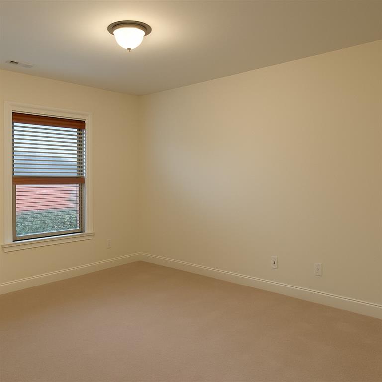 2231 Cain Commons Drive Dacula, GA 30019 - Photo 17 of 20 an empty room with a window