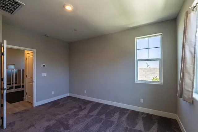 a view of empty room with windows