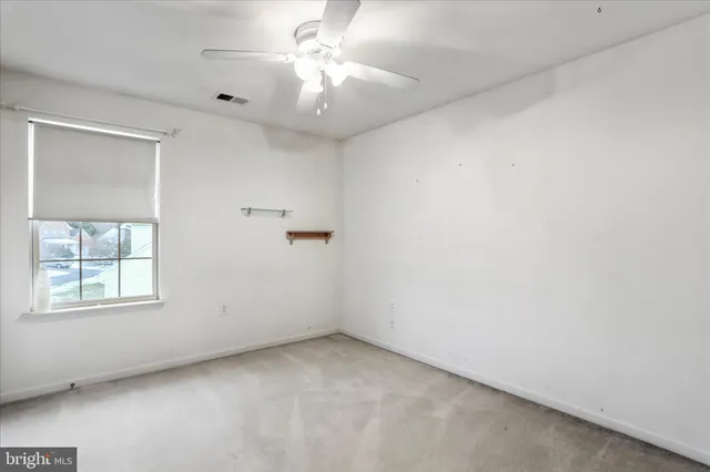 an empty room with a window
