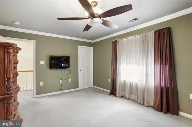a view of a livingroom with a flat screen tv