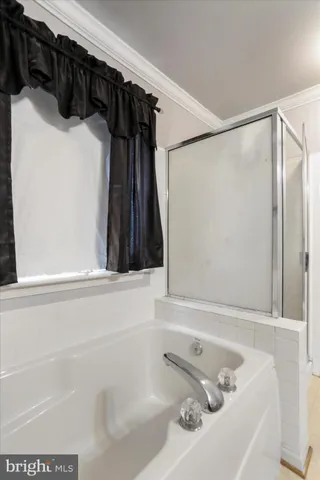 a bathroom with a sink and a shower