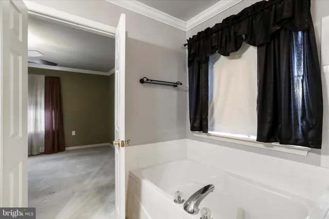 view of a bathroom with a tub