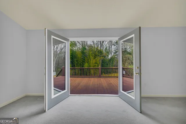 a view of a yard with trees