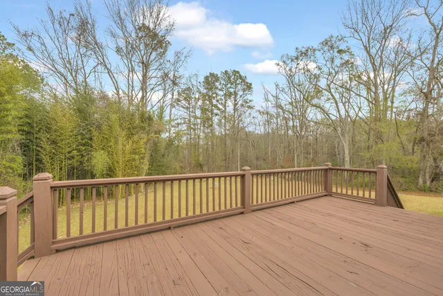 a view of livingroom with an empty room