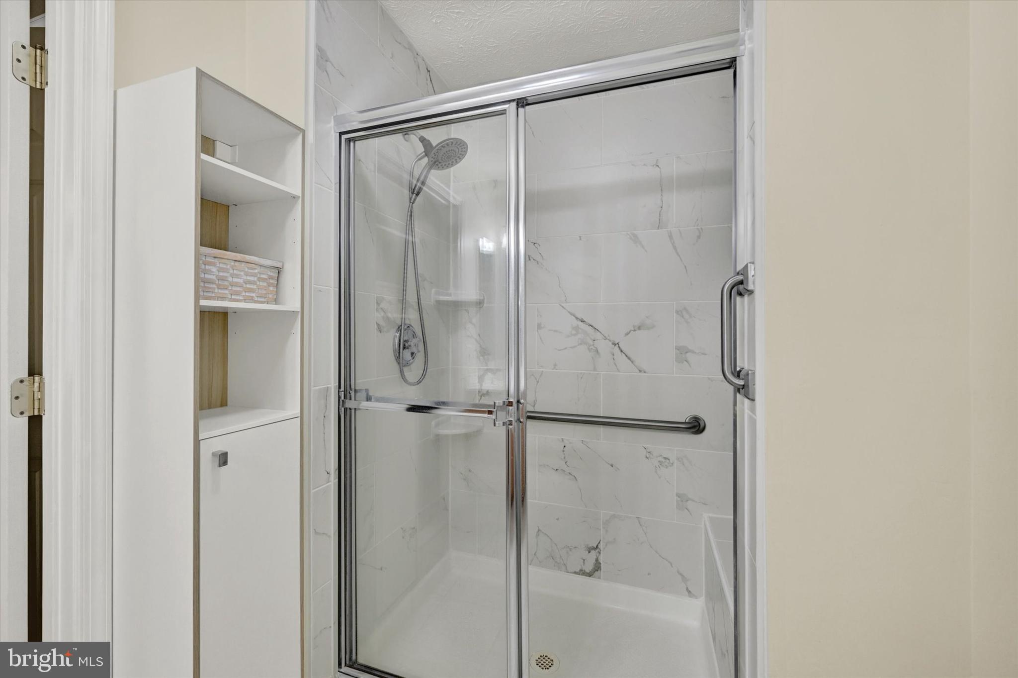 9604 Haven Farm Road, Unit 9604B Perry Hall, MD 21128 - Photo 26 of 39 Primary shower w/seat