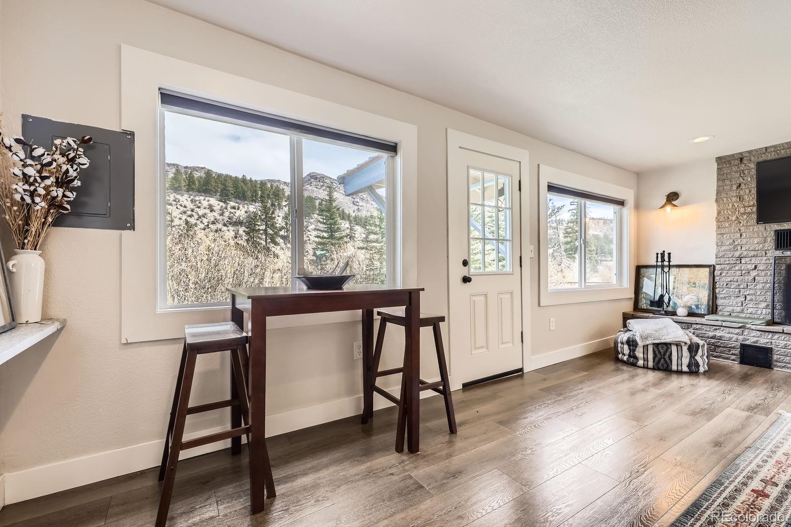 57920 US Highway 285, Unit 8 Bailey, CO 80421 - Photo 7 of 29 a living room with furniture and a window