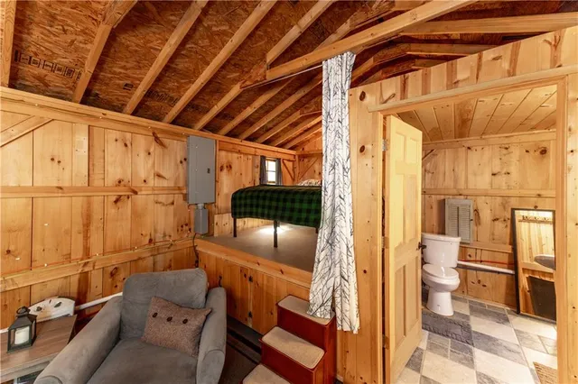 a bathroom with a tub and shower