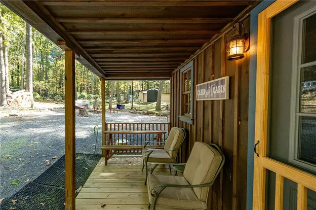 a view of a porch with furniture