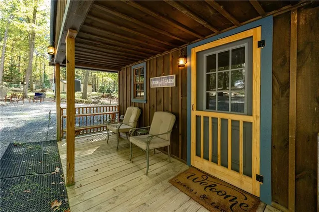 a view of a porch with furniture