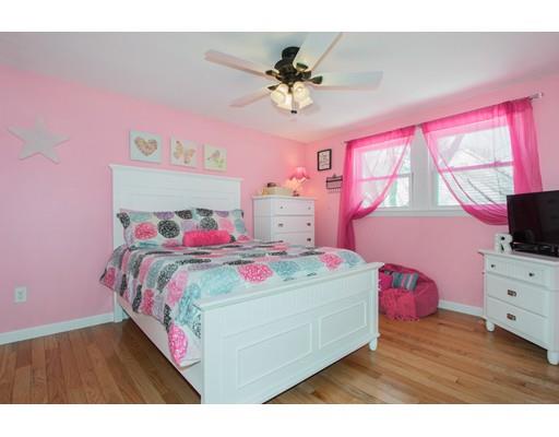 38 Old Bolton Road Hudson, MA 01749 - Photo 16 of 30 a bedroom with a bed and a flat screen tv