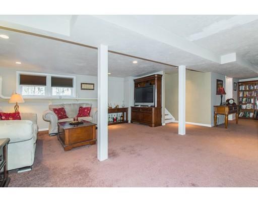 38 Old Bolton Road Hudson, MA 01749 - Photo 25 of 30 a living room with furniture and a gym machine