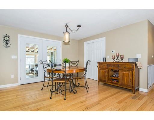 38 Old Bolton Road Hudson, MA 01749 - Photo 6 of 30 a view of a dining room with furniture and wooden floor