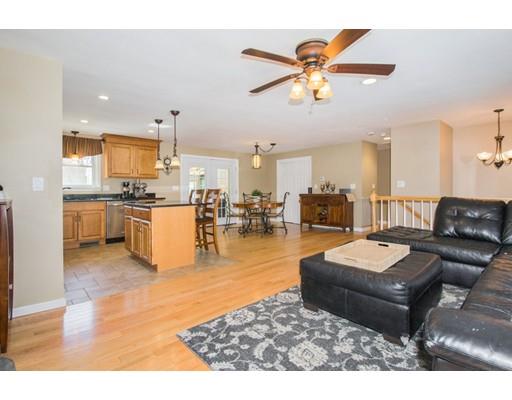 38 Old Bolton Road Hudson, MA 01749 - Photo 7 of 30 a living room with stainless steel appliances furniture and a view of kitchen
