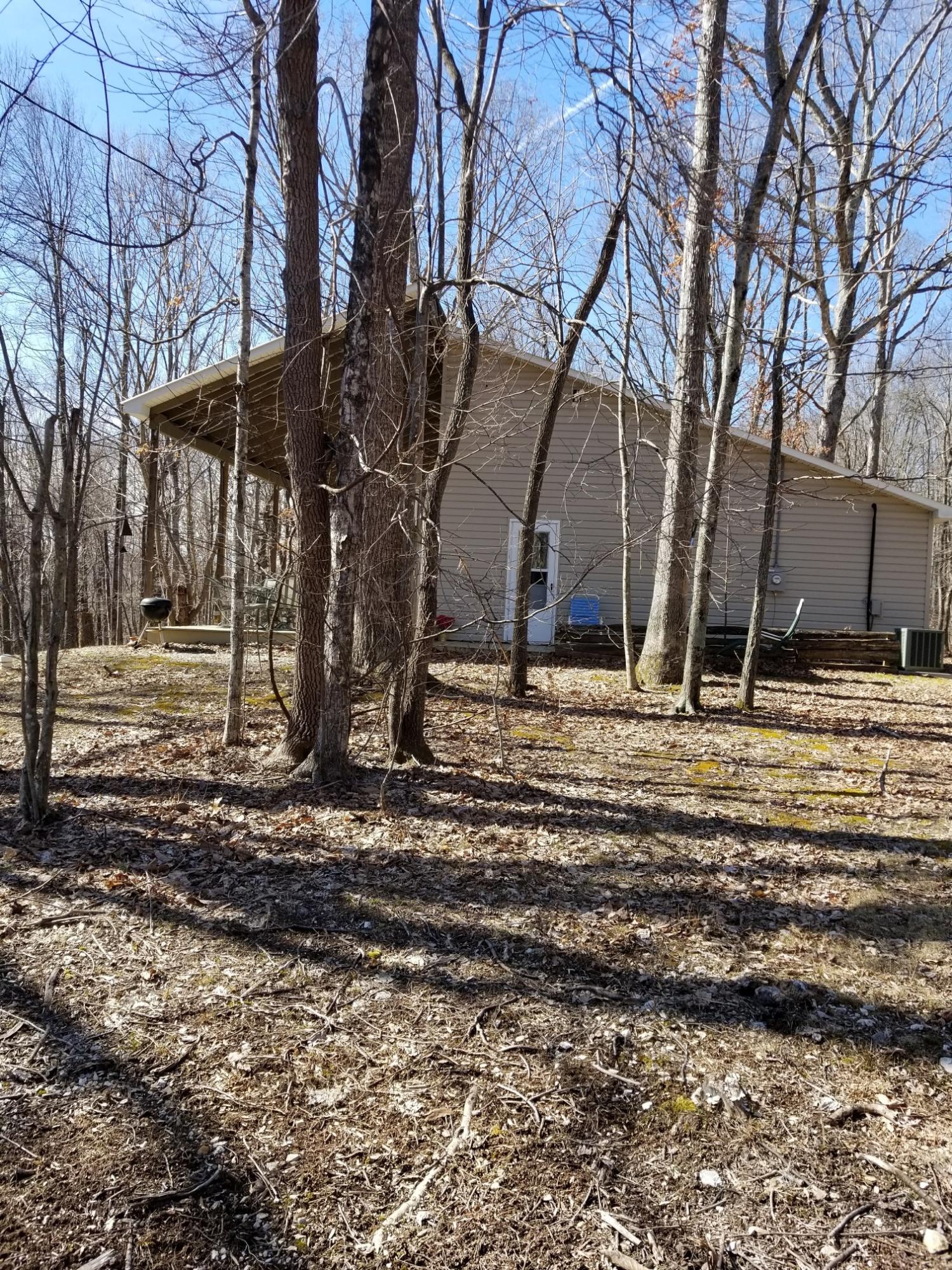 6575 Blacksburg Road Catawba, VA 24070 - Photo 11 of 14 a backyard of a house with lots of green space