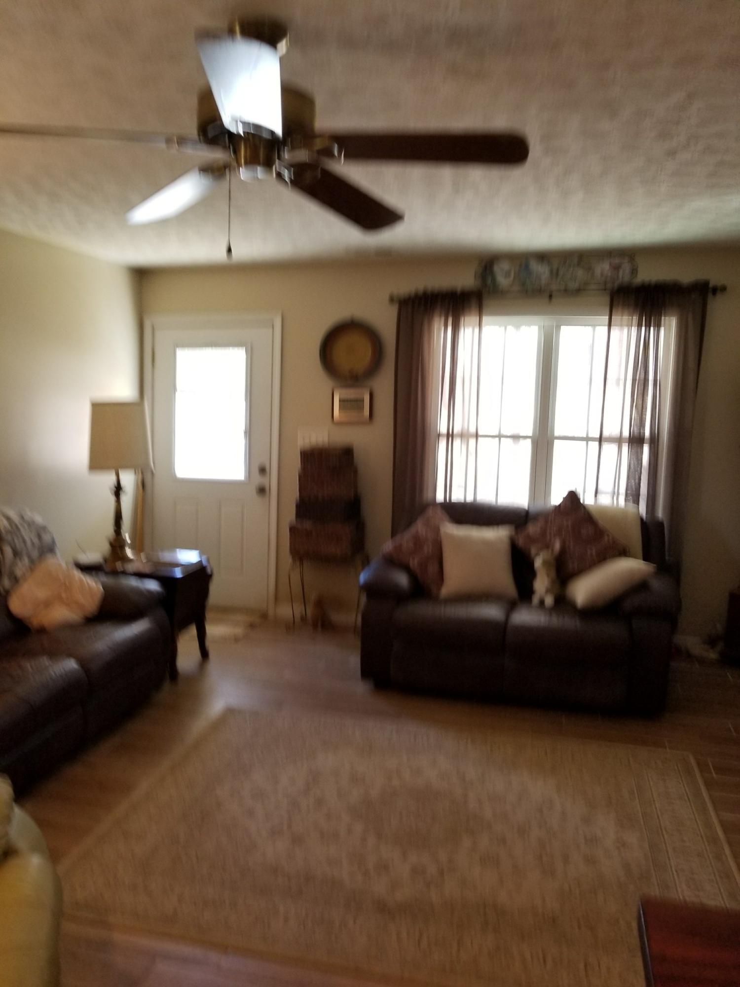 6575 Blacksburg Road Catawba, VA 24070 - Photo 4 of 14 a living room with furniture and a window