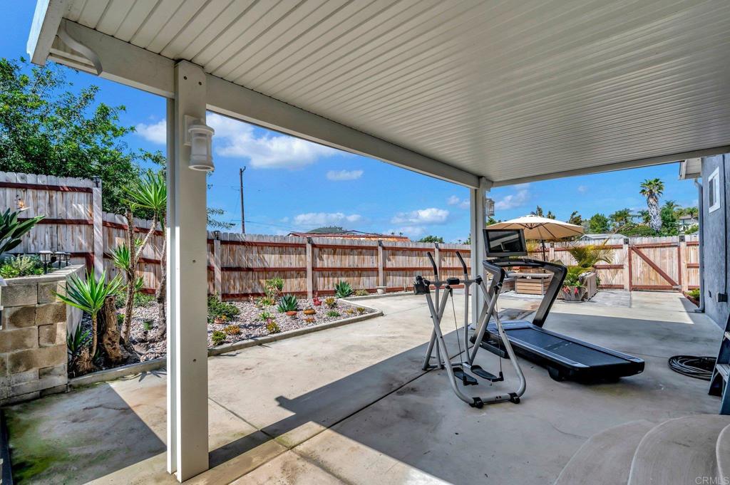 1601 Pepper Drive El Cajon, CA 92021 - Photo 28 of 31 a view of a patio with a table and chairs
