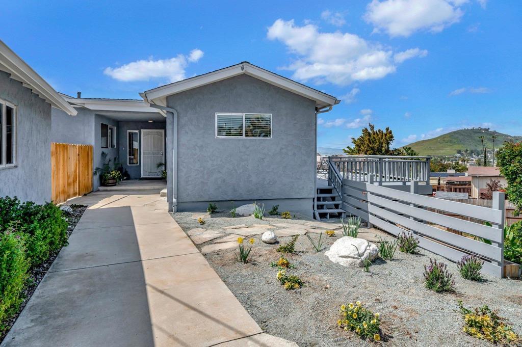 1601 Pepper Drive El Cajon, CA 92021 - Photo 4 of 31 a front view of a house with chairs