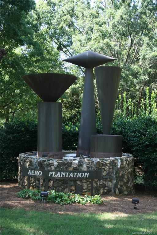 906 Woods Loop Waxhaw, NC 28173 - Photo 1 of 11 a view of a garden