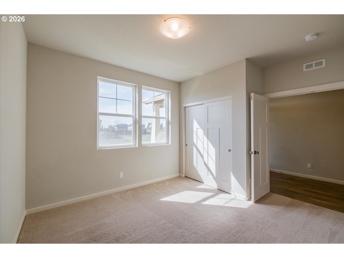 315 Cypress Street Mount Angel, OR 97362 - Photo 38 of 43 a view of an empty room with a window