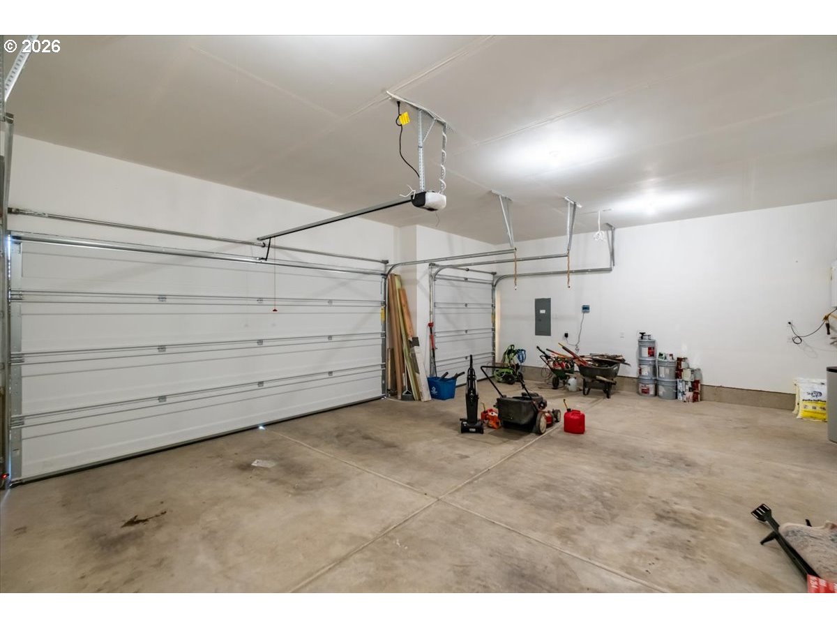 315 Cypress Street Mount Angel, OR 97362 - Photo 41 of 43 a view of a garage with parked cars