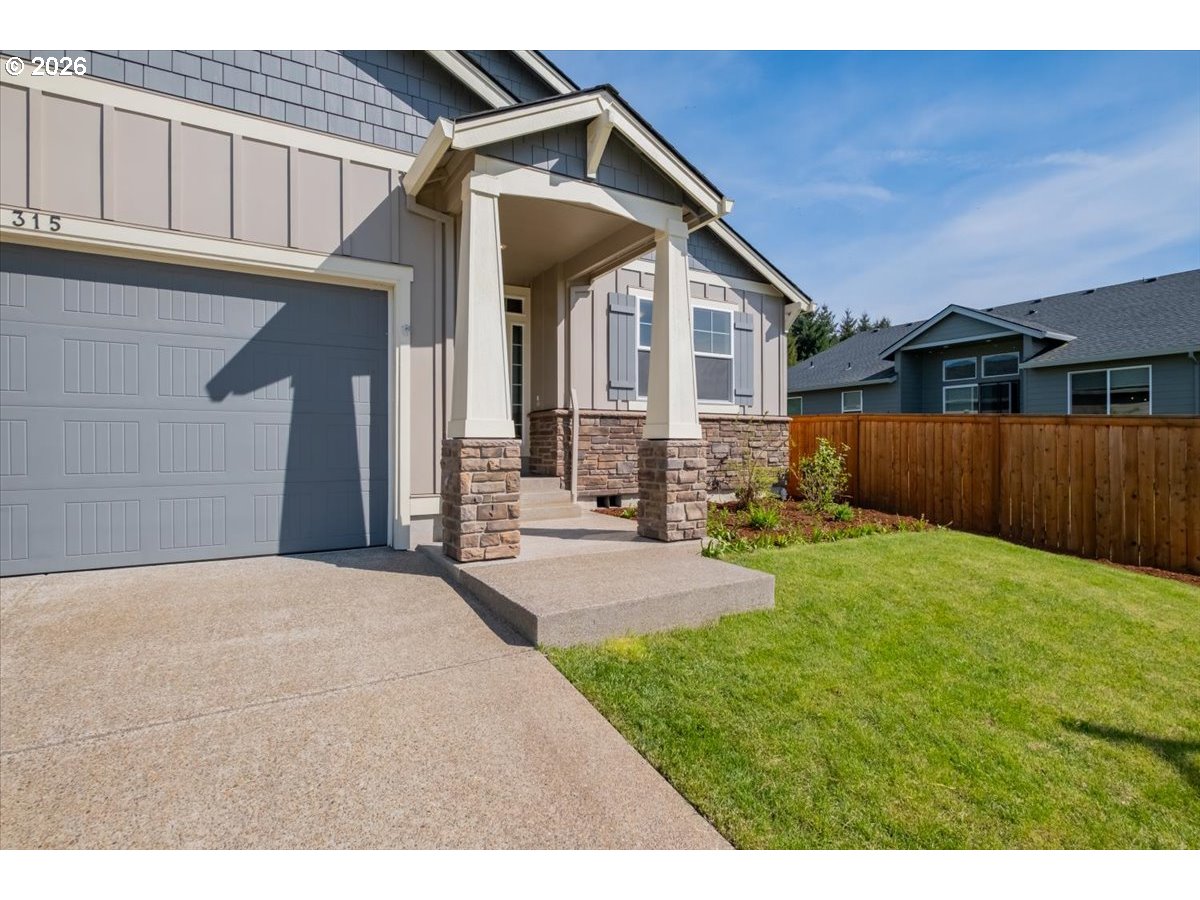 315 Cypress Street Mount Angel, OR 97362 - Photo 6 of 43 a view of a backyard of the house