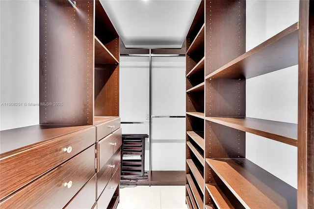 a view of an empty walk in closet